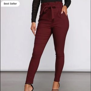 Burgundy high waisted skinny dress pants. Size S